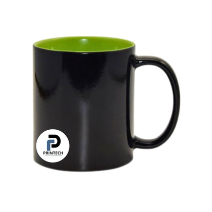 Taza con capacidad de 11 oz, color negro, tipo mágica y inner verde claro
